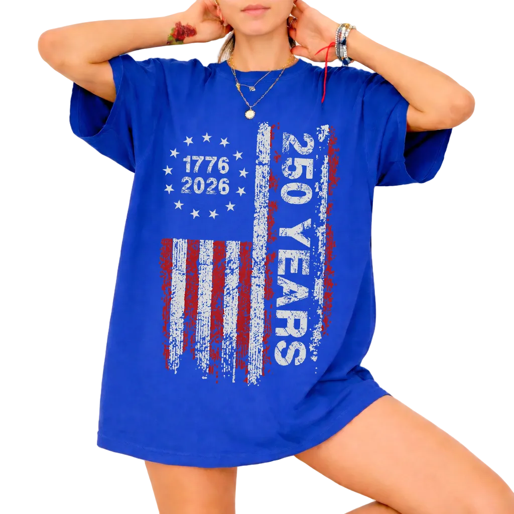 Woman wearing royal blue America 250 shirt 1776–2026 patriotic 4th of July design.