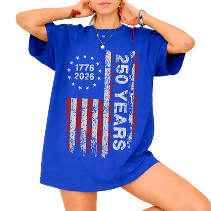 Woman wearing royal blue America 250 shirt 1776–2026 patriotic 4th of July design.
