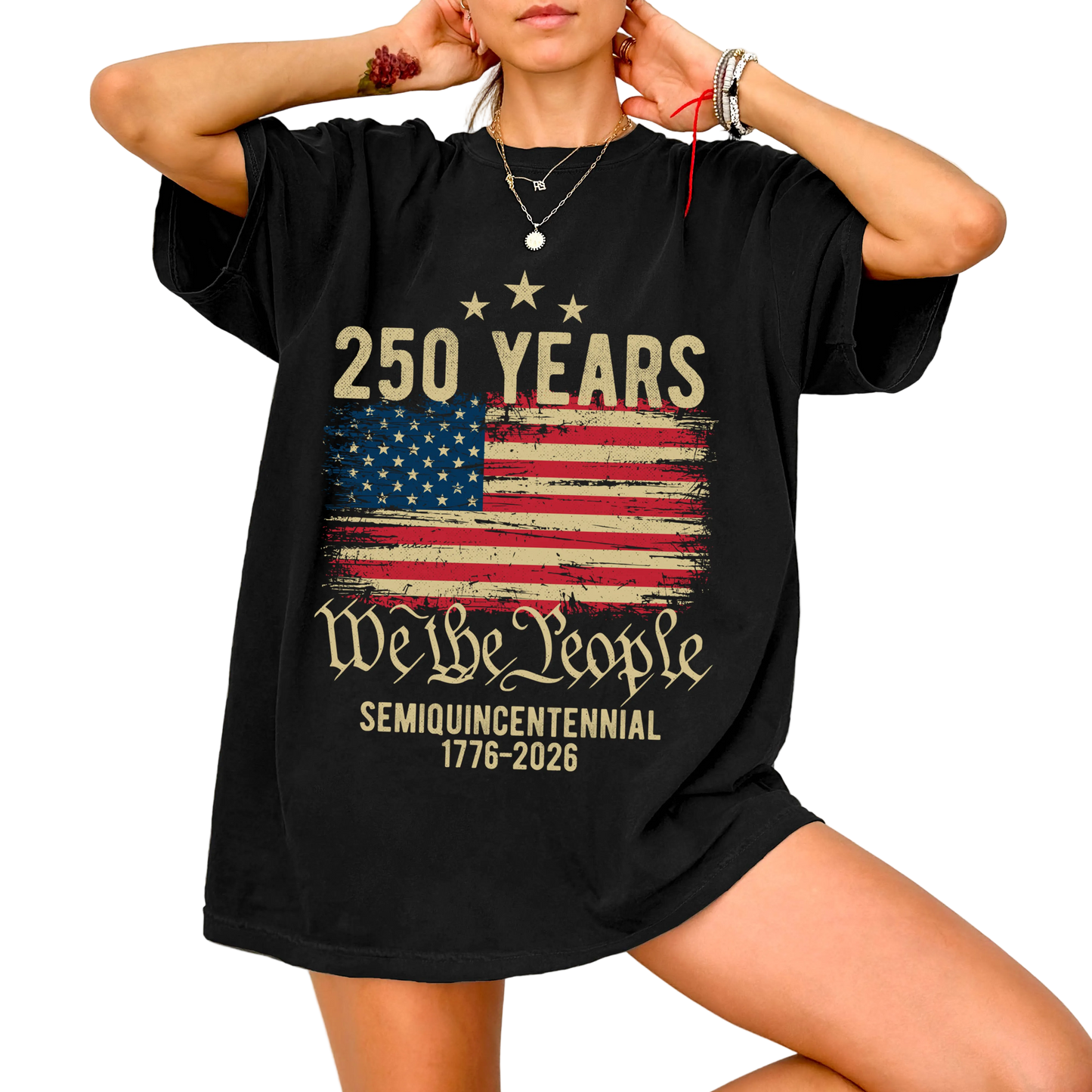 Person wearing black We The People 250 Years 1776–2026 patriotic shirt